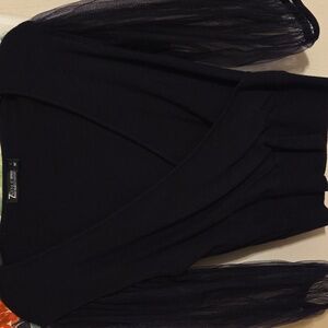 A black sweater size L by 7th Avenue NEW YORK & CO. $18